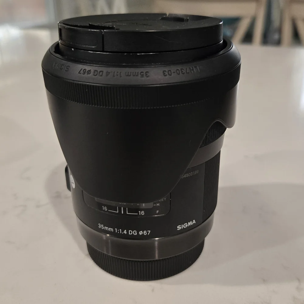 Sigma 35mm f/1.4 DG HSM ART Lens for Canon EOS Cameras With Lens Hood + Pouch